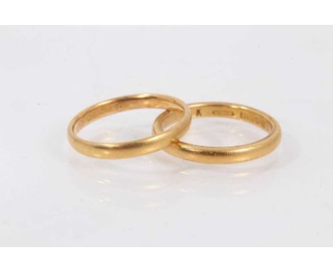 Two 22ct gold wedding rings, size K½ (Birmingham 1934) and size L (Birmingham 1936)Total weight 5.8 grams