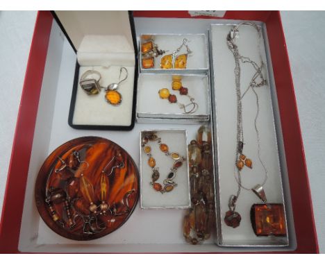 A selection of Baltic Amber jewellery etc including pendants, earrings, ring and bracelet