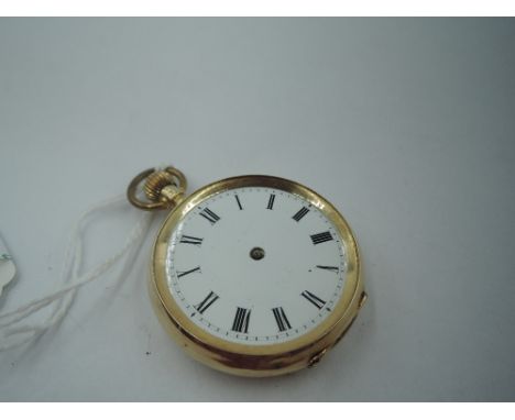 A yellow metal top wound pocket watch stamped 14K having Roman numeral dial, missing pointers, in a plain case, diameter 39mm