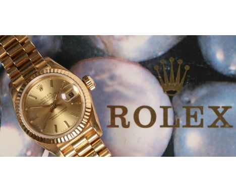 An 18 carat gold Rolex Datejust ladies wristwatch, model no. 69178, case no. T356XXX, circa 1996, the signed gilt dial with b