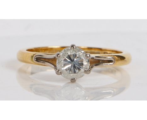 An 18 carat gold and diamond solitaire ring, the single round brilliant cut diamond at 0.68ct approximately, ring size L 1/2,