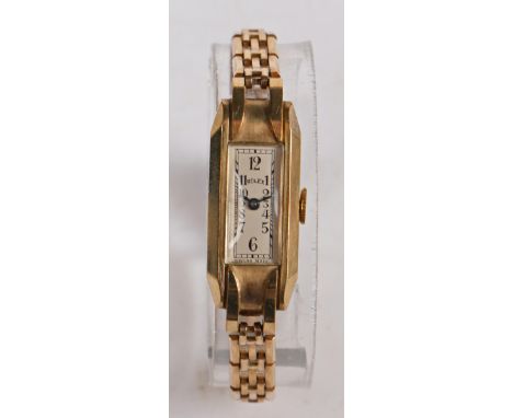 A Rolex 9 carat gold ladies wristwatch, the white rectangular dial with Arabic numerals, the caseback interior with import ma