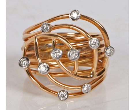 Alessandro Pagani, An 18 carat gold and diamond set ring, the ring formed from eight gold bands intertwining to the head and 