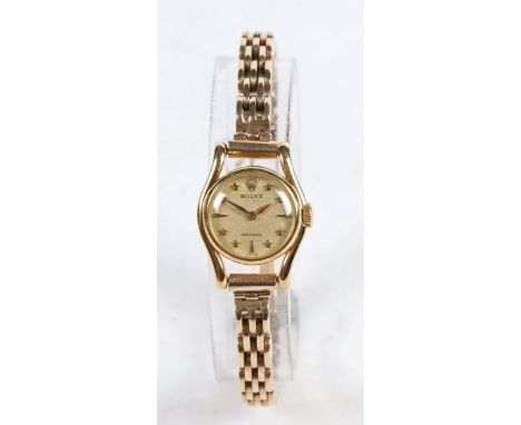 A Rolex 18 carat gold ladies wristwatch, the signed dial with star and triangular markers, manual wound,&nbsp;the case 17.5mm