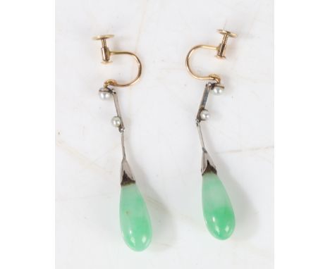 A pair of platinum, jade and pearl earrings, the teardrop form jade drops above pearl set stems, 43mm drop