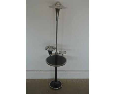 An Art Deco design lamp with ashtray and shelf below finished in black and chrome - approx height 121cm