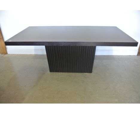 An Eichholtz ebonised dining table - Height 78cm x 200cm x 100cm - Item number DT000102