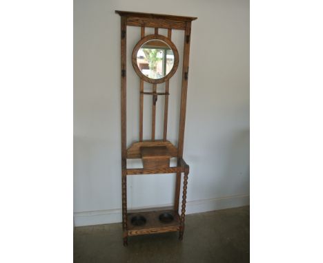 An oak hallstand on bobbin supports - Height 186cm x Width 61cm