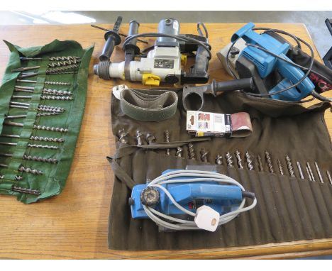 An electric planer, sander and nutool drill and drill bits