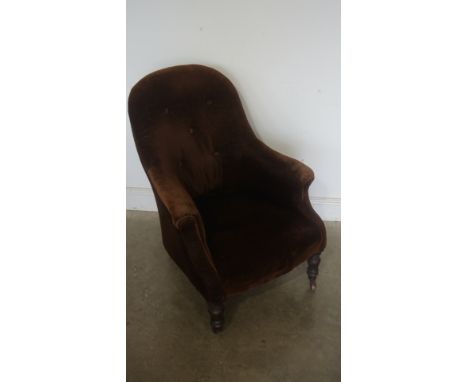 A Victorian upholstered button back chair