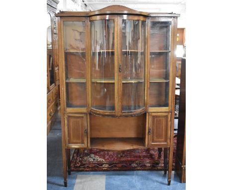 An Edwardian Inlaid Mahogany Breakfront Display Cabinet with Glazed Quadrant Doors Over Open Display Shelf Flanked by Two Sma