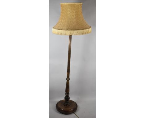 An Edwardian Turned Standard Lamp on Circular Base, With Shade 