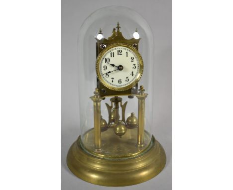 An Edwardian Brass Pillar Clock Under Glass Dome, 28cm high 