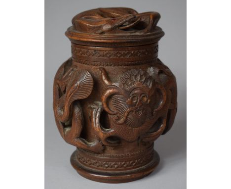A Carved Indonesian Wooden Tobacco/Caddy Box Decorated in High Relief with Dragons, 17cm high