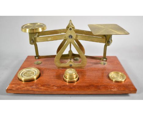 A Reproduction Brass Set of Postage Scales with Weights on Wooden Plinth, 18cm wide 