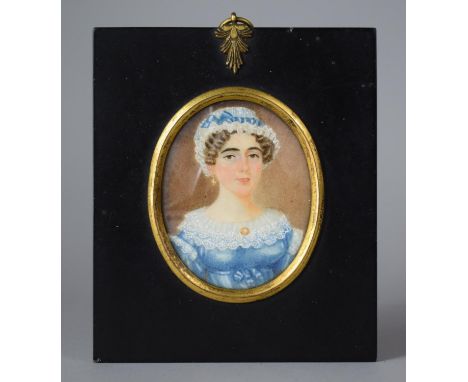 A Framed 19th Century Miniature Portrait of a Lady, The Paper Label Inscribed Verso "Mrs Miller, Miniature Painter, No.38 Hal