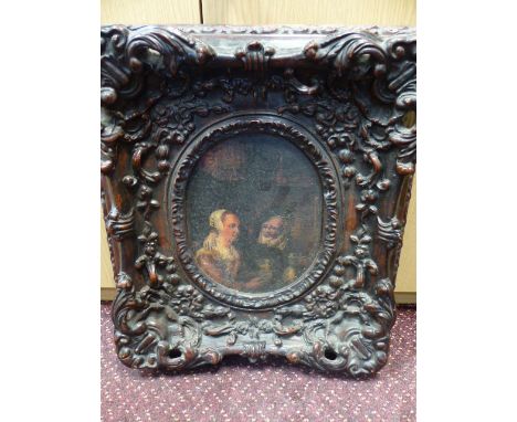 Large ornate and plaster frame with ovular print to middle
