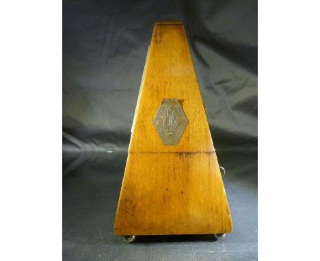 Early Rosewood cased Metronome of Pyramidal Form. Armorial type plaque to front bearing the makers name 'Metronome De Maelzel