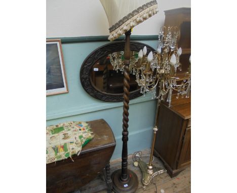 Twist stemmed standard lamp on circular base tasselled parchment shade 