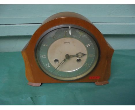 Smiths mantelclock in  light oak domed case