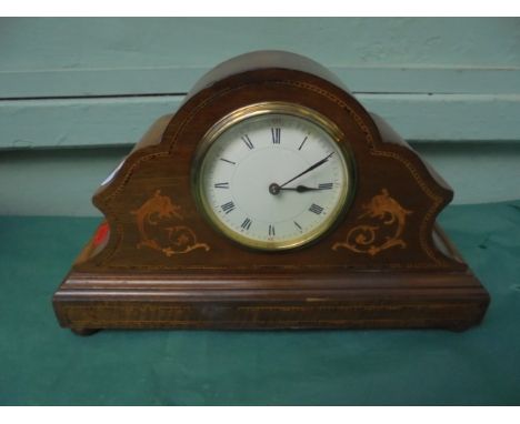 French mantelclock, the enamel dial painted roman numerals all within decorative shaped inlaid domed case