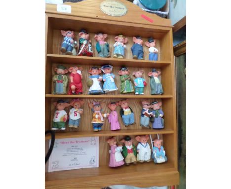 4 shelf display cabinet containing a Danbury Mint collection 'Meet The Trotters' incl. 24 individual pig ornaments, with cert