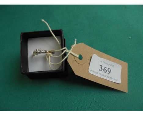 Yellow metal 3 stone diamond ring marked 585 (size M)