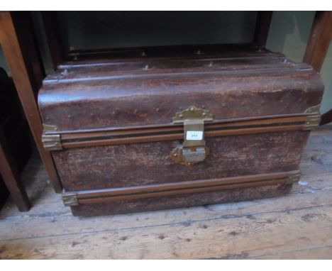 Brass bound brown travelling tin trunk