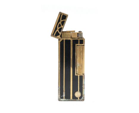 Alfred Dunhill; A rollagas pocket cigarette lighter, having Art Deco inspired gilt brass and enamelled pattern casing.