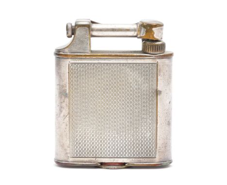 Alfred Dunhill; A 1930s Dunhill 'Unique' lift arm pocket cigarette lighter, petrol filled, silver plated casing with engine t
