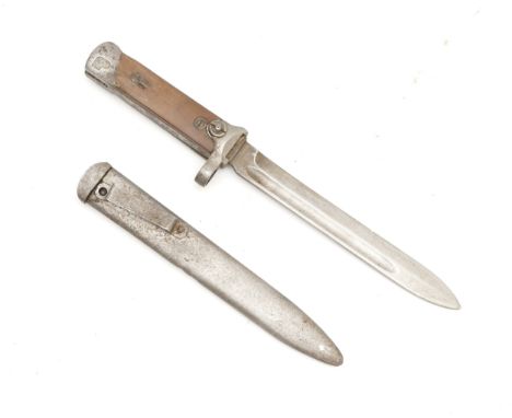 WWII era 1938 Carcano Italian folding bayonet, numbered M83957, complete with metal scabbard, 17.5cm blade.This bladed produc