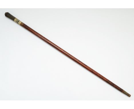An early-twentieth century Indian swordstick, hardwood with an inlaid bone accent, 91cm.This bladed product is not for sale t