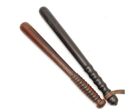 A West Riding plain wood truncheon, stamped Rose over WRC, 37cm, together with another truncheon, stamped J over 8855 over 17