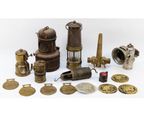 An assortment of brass metalwares, to include, a Miners Lamp, a Joseph Lucas cycle lamp, and Driffield Steam Rally 1990s plaq