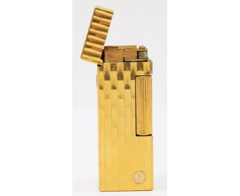 Alfred Dunhill; A gold plated Dunhill rollagas pocket cigarette lighter.