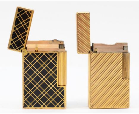 S.t Dupont Paris; A gold plated Dupont pocket cigarette lighter, having black enamel decoration to sides, together with an en