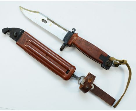 A mid 20th century Russian AKM Type II Bayonet, with scabbard, 15cm.This bladed product is not for sale to people under the a