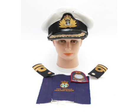 ERII Royal Navy visor cap, manufactured by Paisley's Limited, interior roam leather and behind the queens insignia is the nam