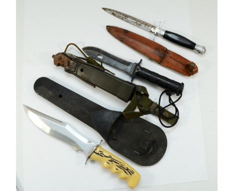 Three knives to include an Italian Scubbard, numbered 15774, Taiwanese survival knife and an unnamed example, all complete wi