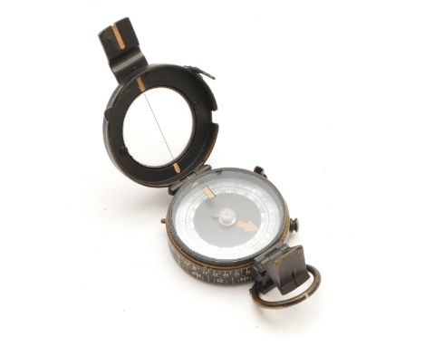 A 1937 J. M. Glauser. London. MKIX military compass, patented B.3136, with leather case.