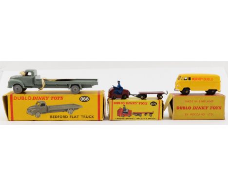 Dublo Dinky Toys; A 071 VW Delivery Van, a 076 Lansing Bagnall Tractor Trailer and a 066 Bedford Flat Truck, in original boxe