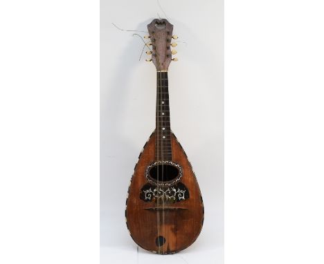 An early 20th century mandolin, bears paper label for 'Giovanni Montana Napoli', inset with mother of pearl decoration and bo