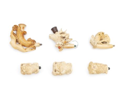 A selection of six early 20th century Meerschaum smoking pipe bowls, hand carved, depicting owls, dogs, deer and a nude femal