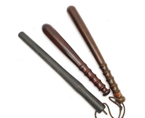 A War Department plain wood truncheon, stamped 27 over broad arrow over WD over P, 32cm, a Metropolitan Police plain wood exa
