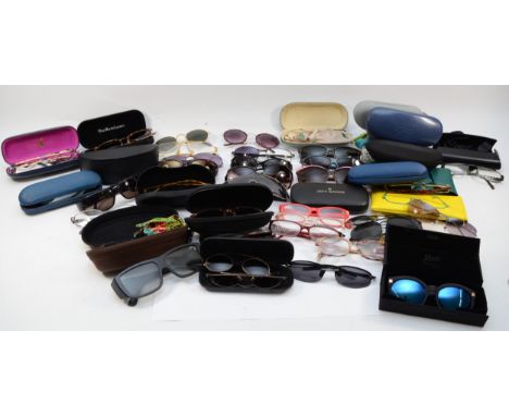 An assortment of over twenty high street and unbranded sunglasses, to include, ASOS, H and M, and Michael Kors.