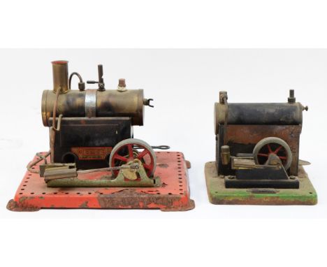 A Mamod stationary steam engine, together with an SEL stationary steam engine.