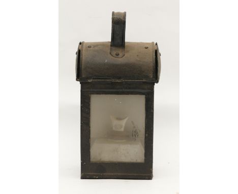 An LMS Railway lantern, with the logo embossed in red, complete with burner, H-28cm.