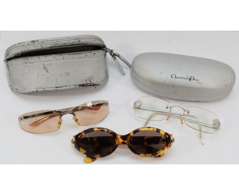 Two cased pairs of vintage Christian Dior sunglasses, together with a a pair of Gianfranco sunglasses. (3)