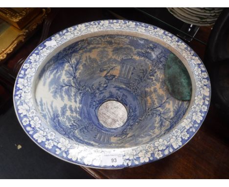 A SPODE TYPE CERAMIC TOILET BASIN with printed blue and white Italian style decoration, 9" high x 17.5" deep