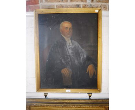 A 19TH CENTURY OIL ON CANVAS PORTRAIT of a clergyman, 25.5" high x 19.5" wide